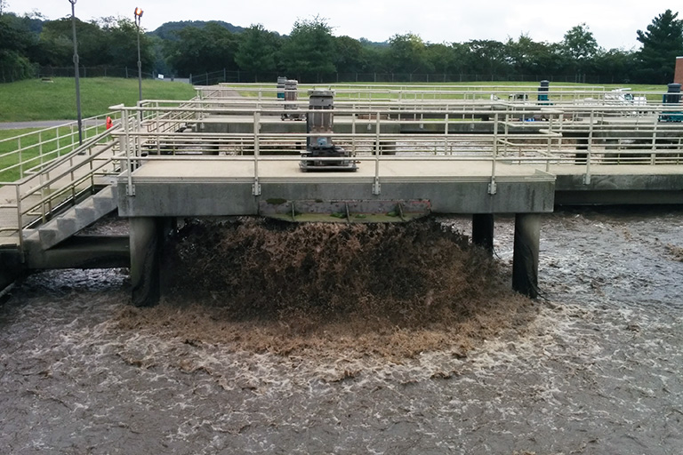 Water gushes at a wastewater treatment plant.