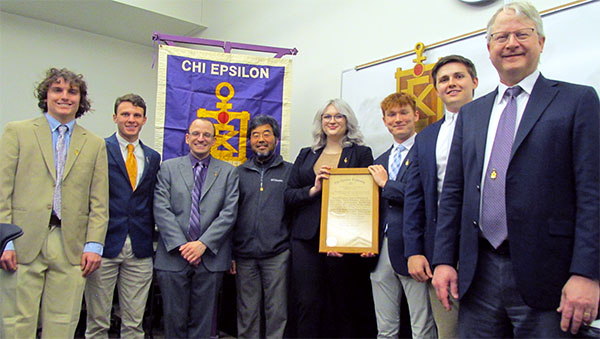 Jackson Reeves, Austin Reeves, Timothy Truster, Zhongguo Ma, Arden Lady, Avery Burnham, Joseph Robertson, and Chris Cox: A mix of faculty and students being presented with Chi Epsilon membership induction.