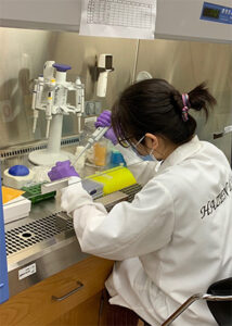 Ye Li conducts research at a laboratory desk
