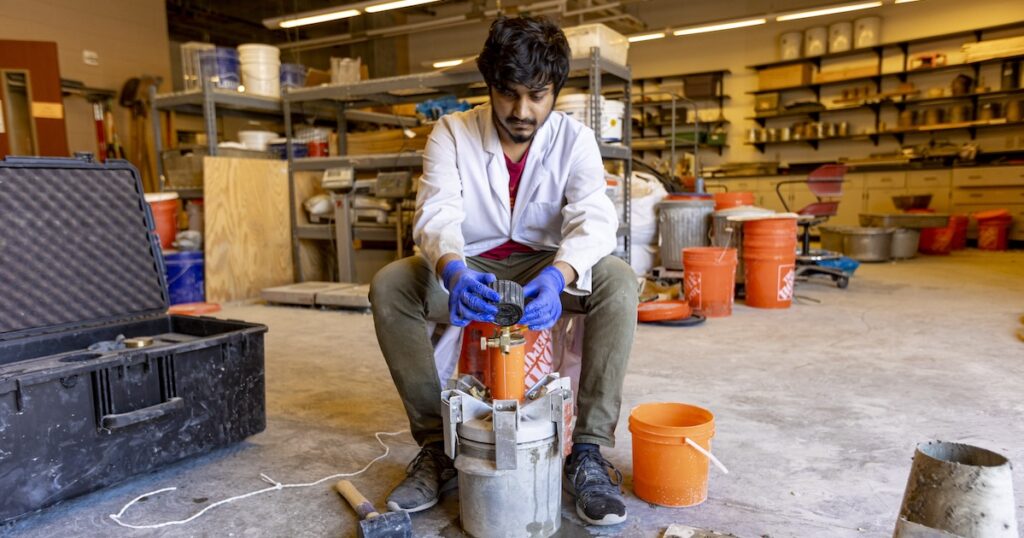 Sazzadul Saykat working on a concrete mixture