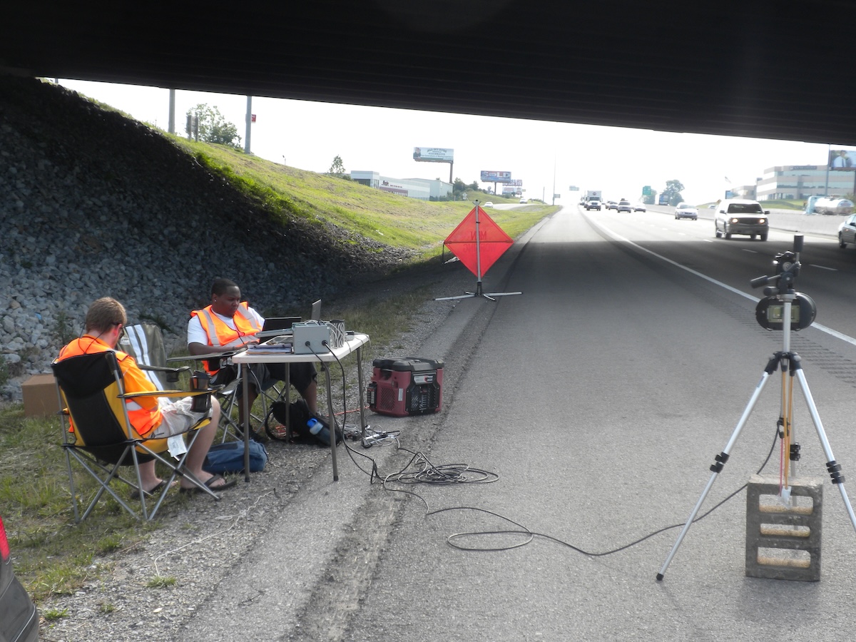 James Ensley III collecting data on a road in Tennessee