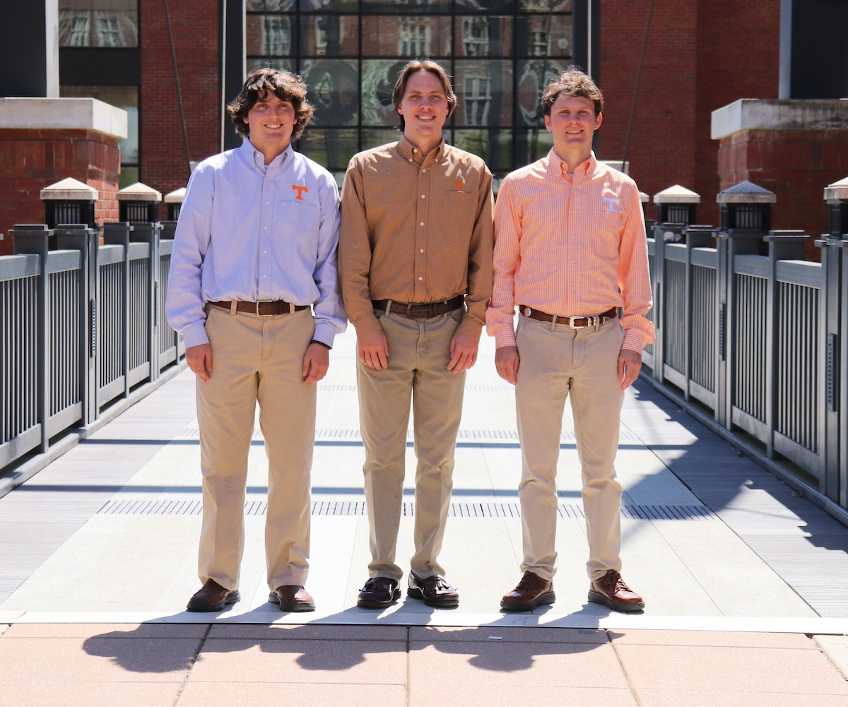 Walker, Jackson, and Grey Reeves standing in front of the John D. Tickle Engineering building on UTK campus