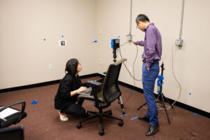 Jiannan Cai and Shuai Li setting up a test for their technology