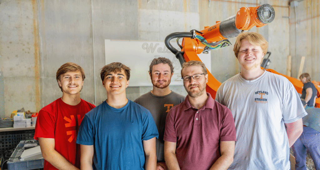Ben Holley and his senior design team in the CHAMP garage at the University of Tennessee
